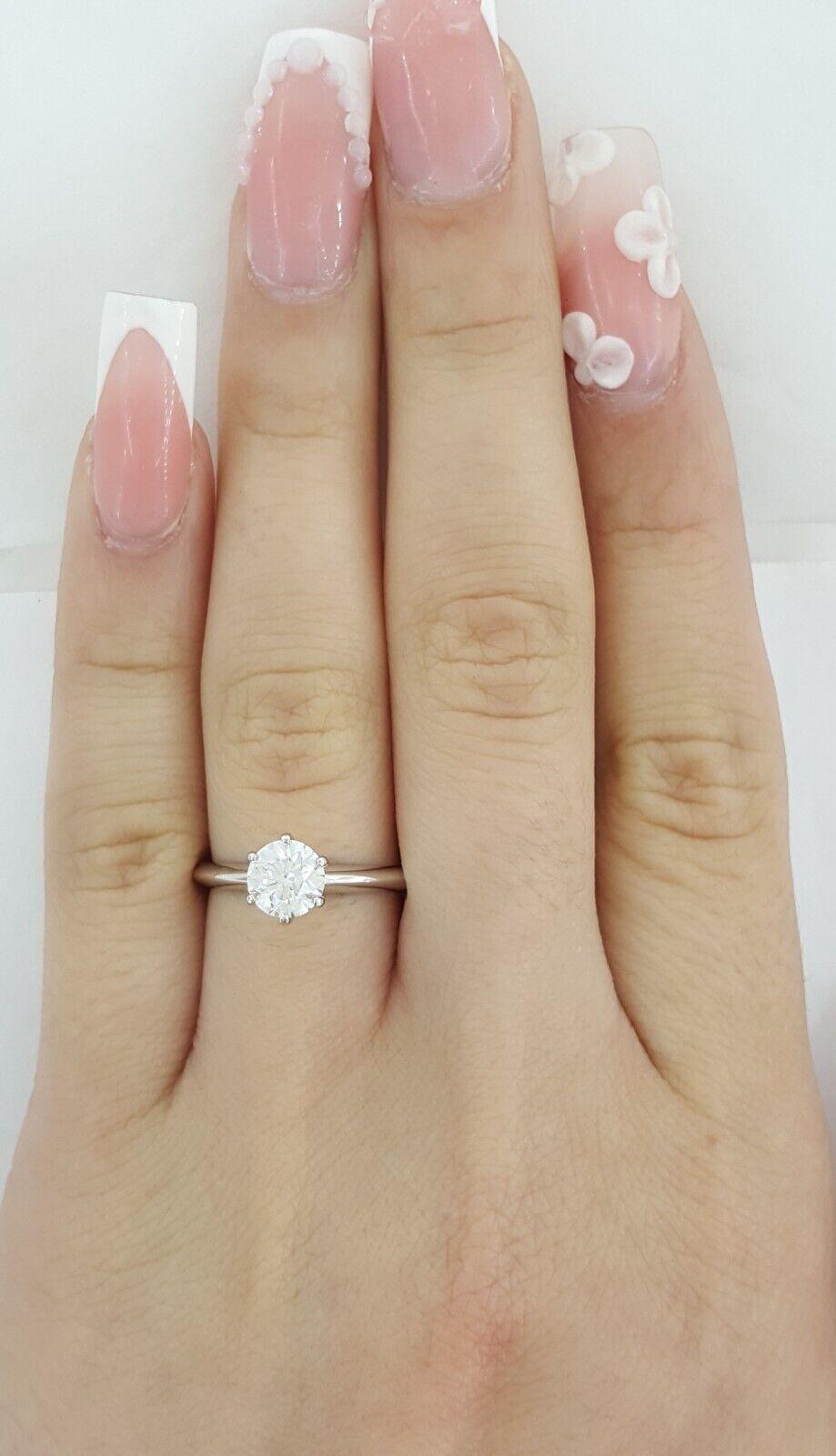 Tiffany & Co Round Diamond Solitaire Platinum Engagement Ring 0.74 ct Rtl 10.6K