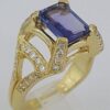 18K Yellow Gold 4.34 ct Natural Emerald Cut Tanzanite & Round Diamond Ring
