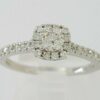 0.6 ct 14K White Gold Round Brilliant Cut Diamond Halo Engagement Ring