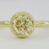 Bezel Set Fancy Yellow Diamond Solitaire Engagement Ring 0.75 ct 18K Gold GIA