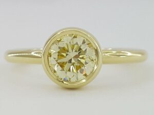 Bezel Set Fancy Yellow Diamond Solitaire Engagement Ring 0.75 ct 18K Gold GIA