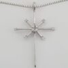 0.1 ct 18K White Gold Round Cut Diamond Snowflake / Starburst Cross Pendant