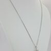 0.1 ct 18K White Gold Round Cut Diamond Snowflake / Starburst Cross Pendant