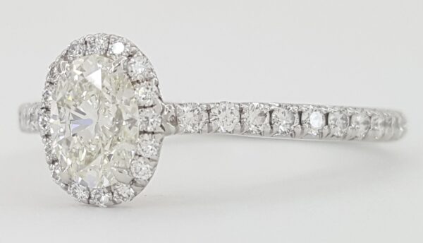 Tiffany & Co Soleste Oval Diamond Halo Platinum Engagement Ring 0.7 ct Rtl $8K