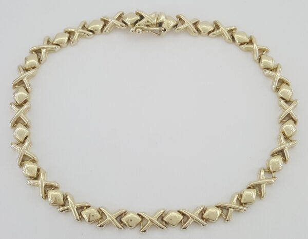 Lightweight "X" Link Bracelet Italy 7.4" 5 mm 7.5 grams 14K Yellow Gold